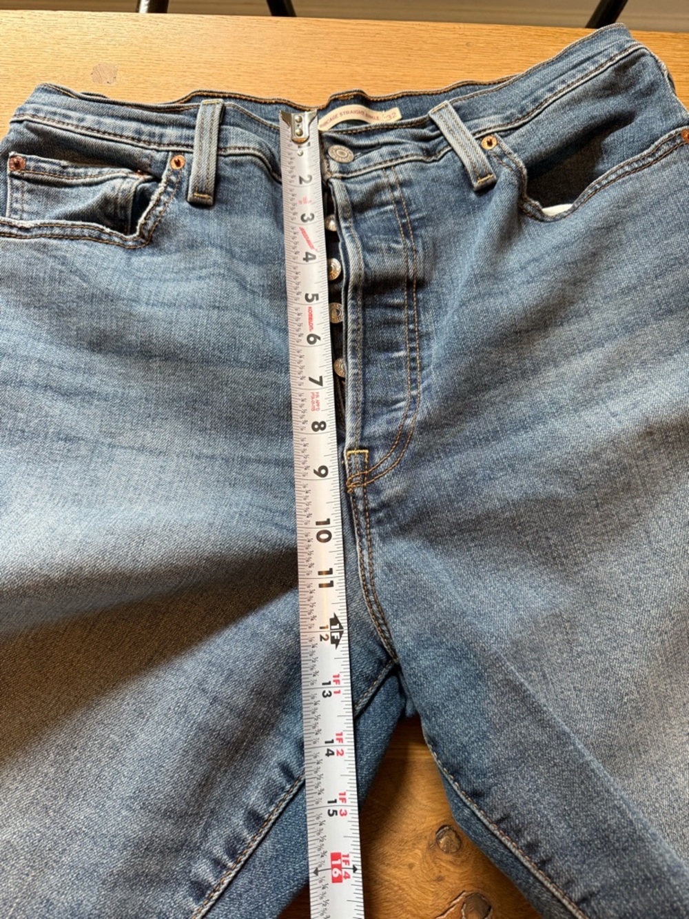 Levi's High-Rise Button-Fly Jeans in Medium Blue Wash